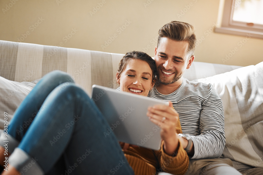 Happy couple, love or tablet in home for movie choice and streaming option online on sofa in living room. Relax, support or people chill in lounge on social media app on digital website or technology