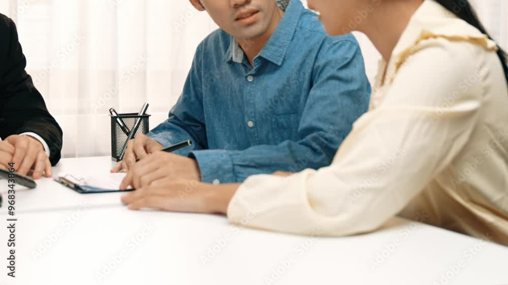 Lawyer act as mediator offer a compromise between two parties to resolve business dispute through negotiation at law firm office. Legal mediation and conflict resolution service. Slow motion. Rigid. Lawyer act as mediator offer a compromise between two parties to resolve business dispute through negotiation at law firm office. Legal mediation and conflict resolution service. Slow motion. Rigid.