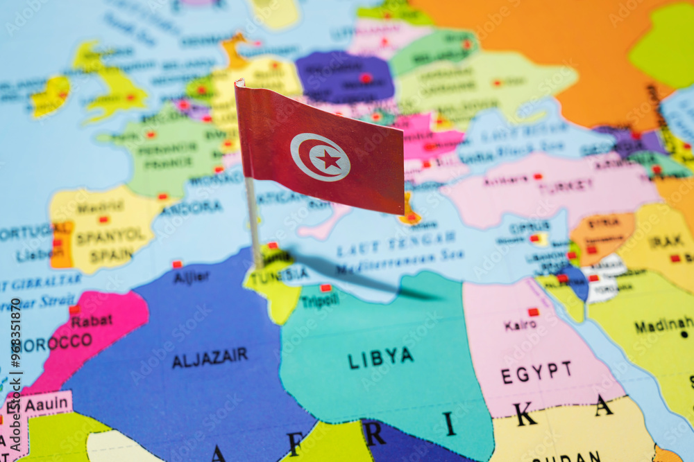 Naklejka premium A map of Tunisia with the Tunisian flag on it