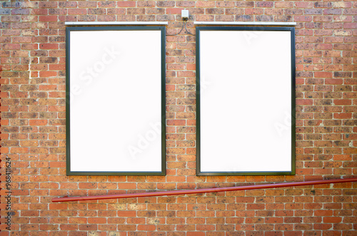 Wallpaper Mural Background texture of two blank vertical billboard mockups side by side on a brick wall in a public space. Empty poster copy space for advertising and commercial marketing. Torontodigital.ca