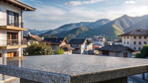 Empty stone or marble tabletop or counter with display product with blured city, town, outdoor background.