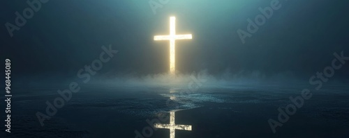 Glowing cross reflection on misty water, spiritual photo