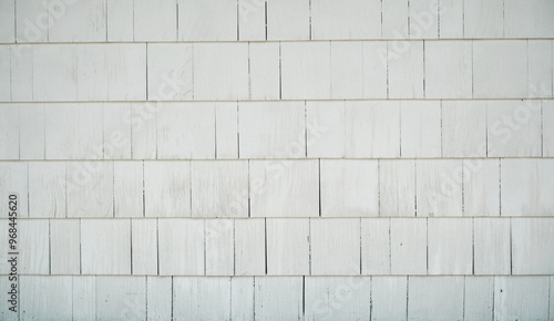Valokuva Old building or wall with aged white plain siding of cedar or cement planks or s