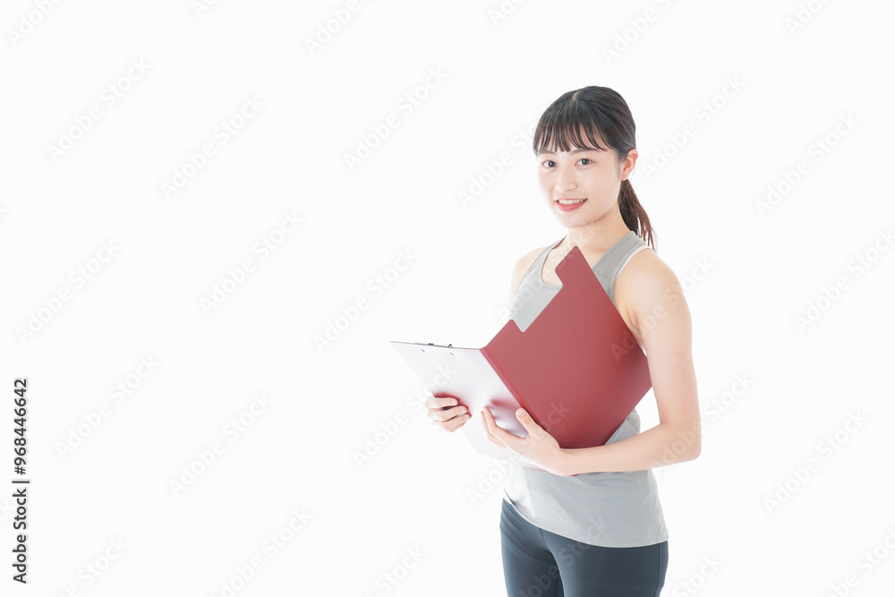 スポーツウェアを着た若い女性