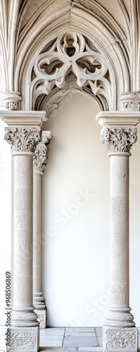 Elegant stone archway with detailed carvings and columns  showcasing classic architectural beauty and historical design.