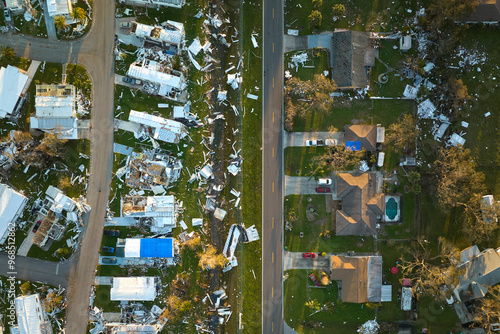 Tableau sur toile Severely damaged by hurricane Ian houses in Florida mobile home residential area