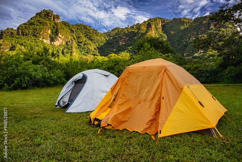 Two camping tents in the mountains