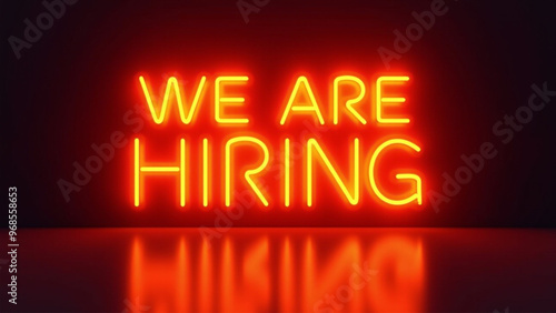 We Are Hiring Neon Sign on Dark Background