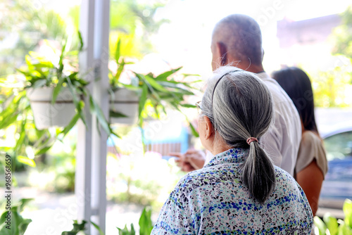 Rear View Of Asian Family Gardening Activity Outdoor 