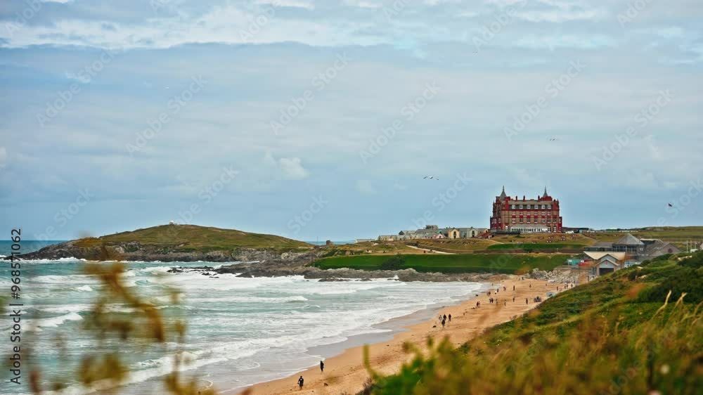 Panoramic view of over the Cornish Coastline in the United Kingdom.
View of the long stretching beach,. Green lush fields and the sea waves coming to the shore.
Touristic attraction to visit Cornwall Panoramic view of over the Cornish Coastline in the United Kingdom.
View of the long stretching beach,. Green lush fields and the sea waves coming to the shore.
Touristic attraction to visit Cornwall