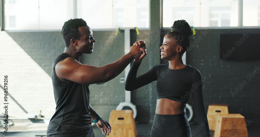 Break, fitness and high five with black people in gym for challenge, sports training or workout. Smile, success or support with athlete and person trainer in health club for exercise goals or target Break, fitness and high five with black people in gym for challenge, sports training or workout. Smile, success or support with athlete and person trainer in health club for exercise goals or target