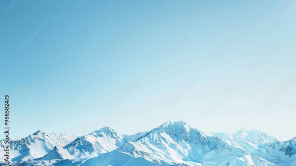 Snow-capped mountain peaks under clear blue sky with distant horizons Snow-capped mountain peaks under clear blue sky with distant horizons