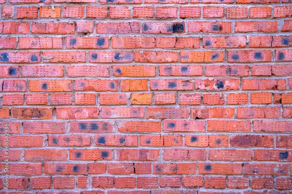 Fototapeta premium Red brick wall background. Old brickwork texture. Rock block pattern. Vintage stonewall. Abstract grunge urban design. Textured surface building.