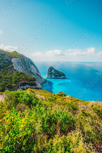 Plakaki beach on Zakynthos island or Zante Island, Greece. Beautiful views of azure sea water and nature with cliffs cave