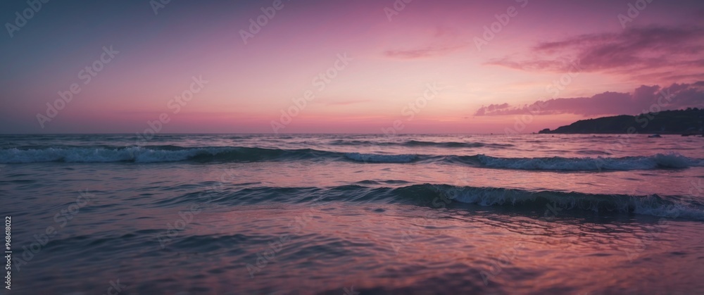 A beautiful pink and blue ocean scene with a purple sky. A beautiful pink and blue ocean scene with a purple sky.