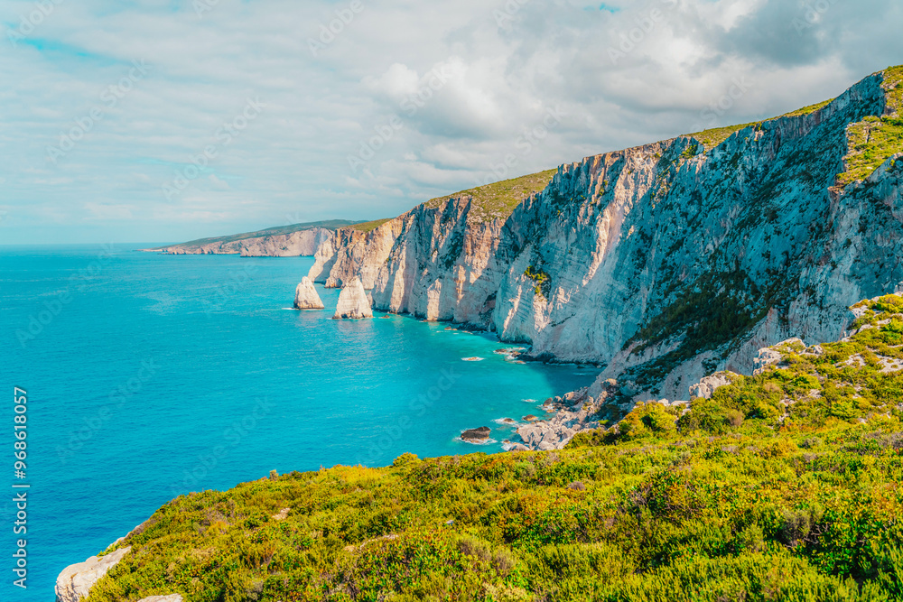 Fototapeta premium Plakaki beach on Zakynthos island or Zante Island, Greece. Beautiful views of azure sea water and nature with cliffs cave