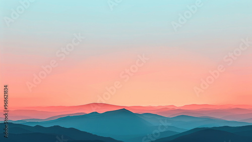 Mountain silhouettes at sunset with soft orange and pink sky