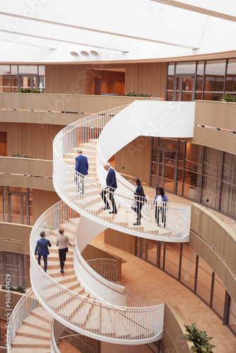 Wallpaper Mural High angle view of business people moving up of steps in office Torontodigital.ca