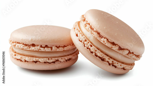 Elegant Pink Macarons with Creamy Filling on White Background