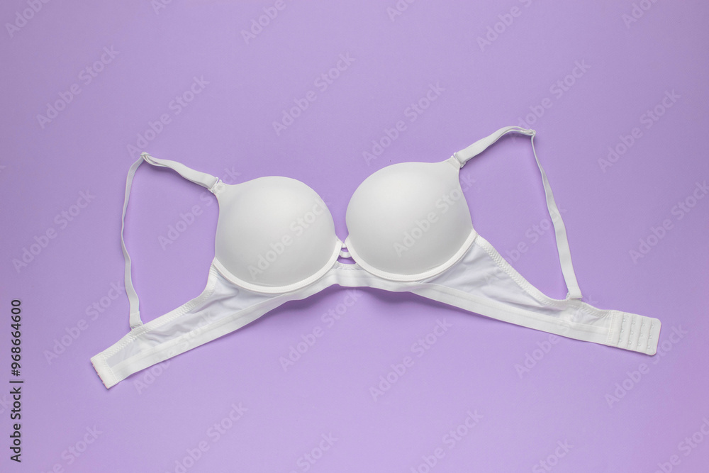 White Bra on Lilac Background - Feminine Lingerie, Fashion Accessory, Minimalist Style, Intimate Apparel White Bra on Lilac Background - Feminine Lingerie, Fashion Accessory, Minimalist Style, Intimate Apparel