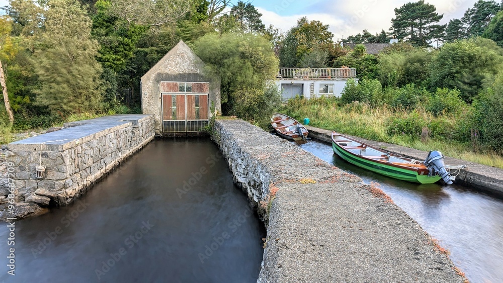 Beautiful lakeside landscape scenery, house by the lake near Oughterard pier on Corrib lake, Galway, Ireland, nature background