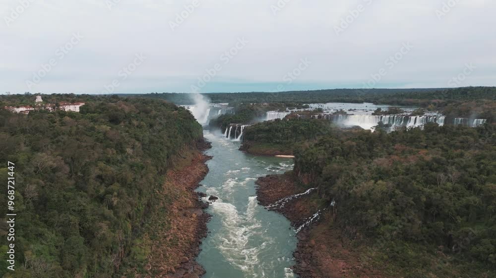 Aerial view of the majestic Iguazu Falls on Brazil-Argentina border. Natural wonder of the world. UNESCO.
