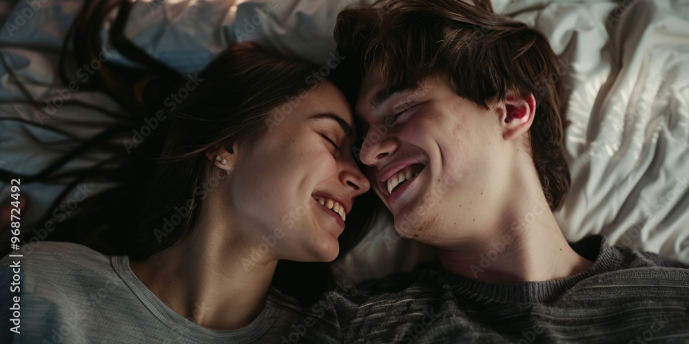 Happy couple laughing and smiling, enjoying each other's company. Happy couple laughing and smiling, enjoying each other's company.