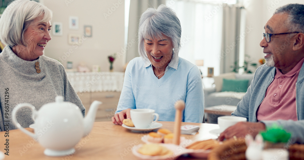 Happy, tea and senior friends at table for funny conversation, snacks and retirement together in house. Group, party and man speaking with elderly women smile for breakfast, communication and bonding