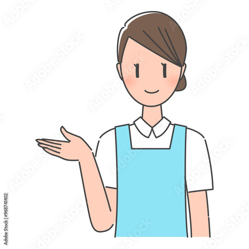 ブルーのエプロン姿、笑顔で案内する歯科助手・歯科衛生士の女性スタッフ