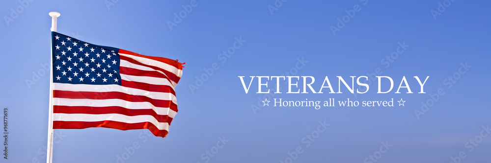 Obraz premium American flag on panoramic sky background with text for Veterans Day web banner