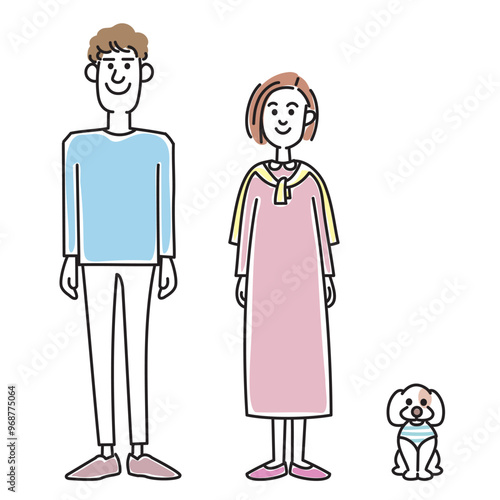おしゃれな若い夫婦と可愛い子犬
