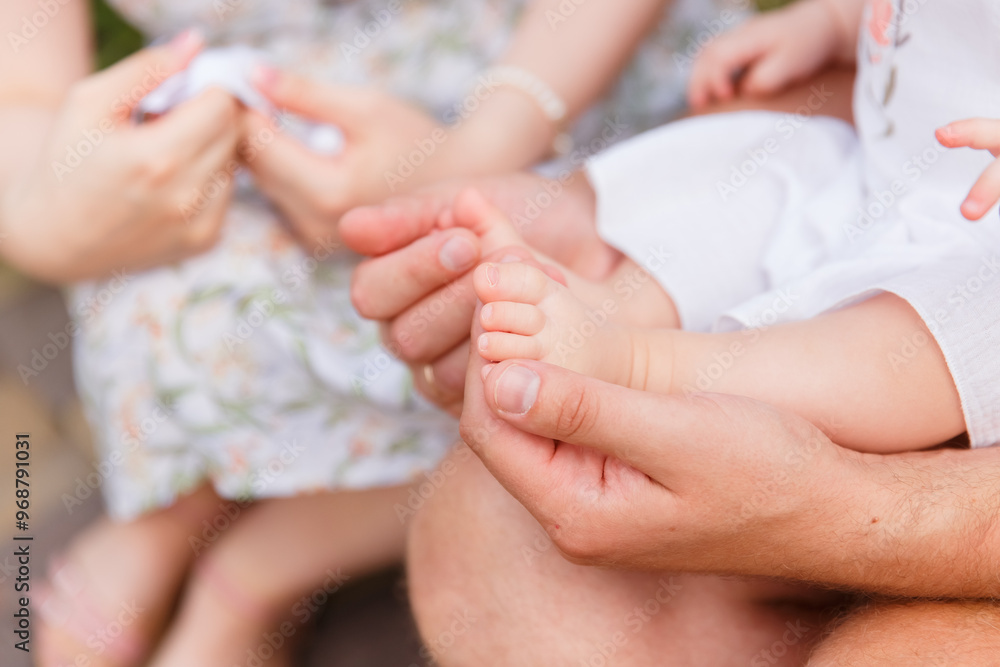 Naklejka premium small children's legs, legs of newborn babies
