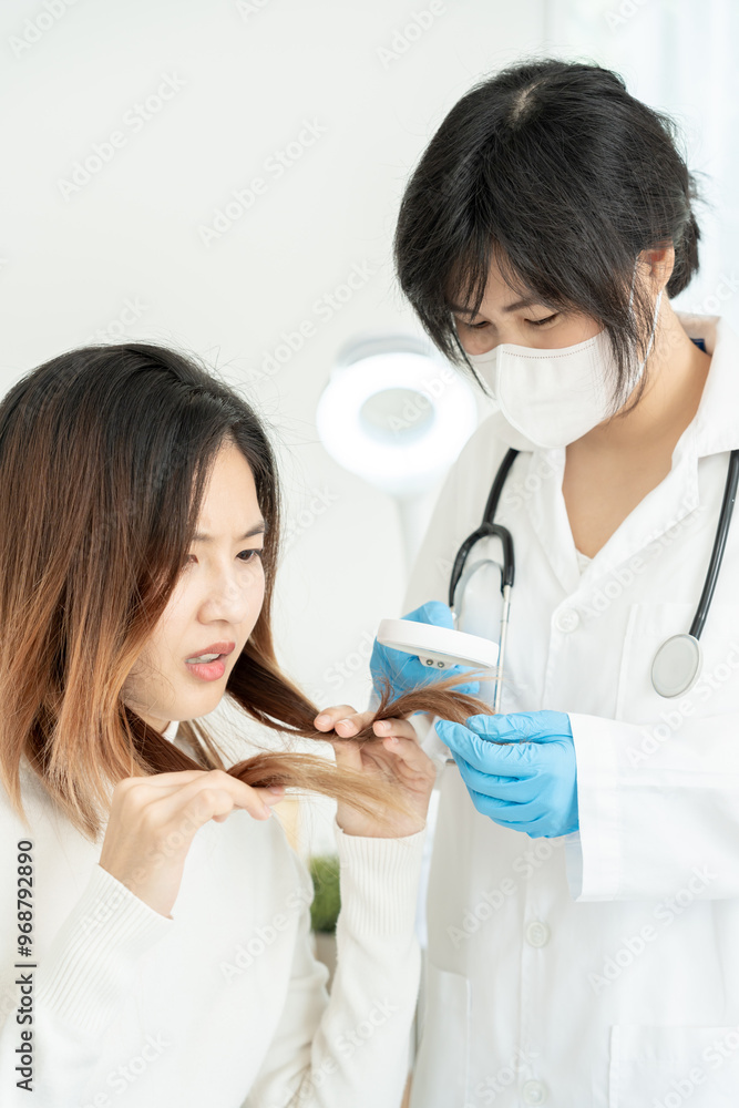 Specialist of hair recheck hair of Asian woman, damaged hair, hair loss, thinning problem, vitamin deficiency, baldness, postpartum, biotin, zinc, menstrual or endocrine disorders, hormonal imbalance Specialist of hair recheck hair of Asian woman, damaged hair, hair loss, thinning problem, vitamin deficiency, baldness, postpartum, biotin, zinc, menstrual or endocrine disorders, hormonal imbalance