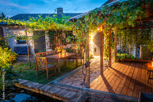 Wallpaper Mural Rustic courtyard in the evening lit by candles light Torontodigital.ca