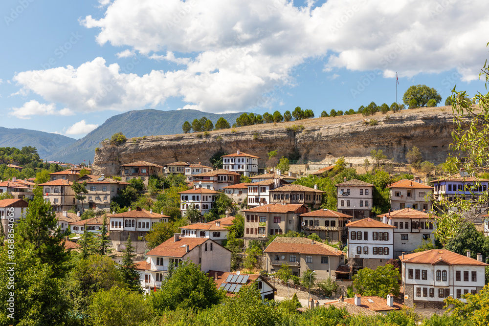 Naklejka premium Traditional Ottoman Houses in Safranbolu. Safranbolu UNESCO World Heritage Site. Old wooden mansions turkish architecture. Safranbolu landscape view.