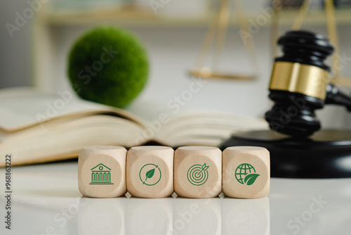 Wooden cubes with a decarbonization icon and green icon.Law for environmental regulation.Sustainable environment concept. photo