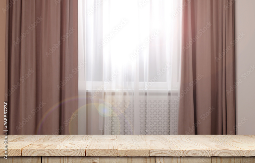 Empty white wooden table near window with curtains. Space for design Empty white wooden table near window with curtains. Space for design