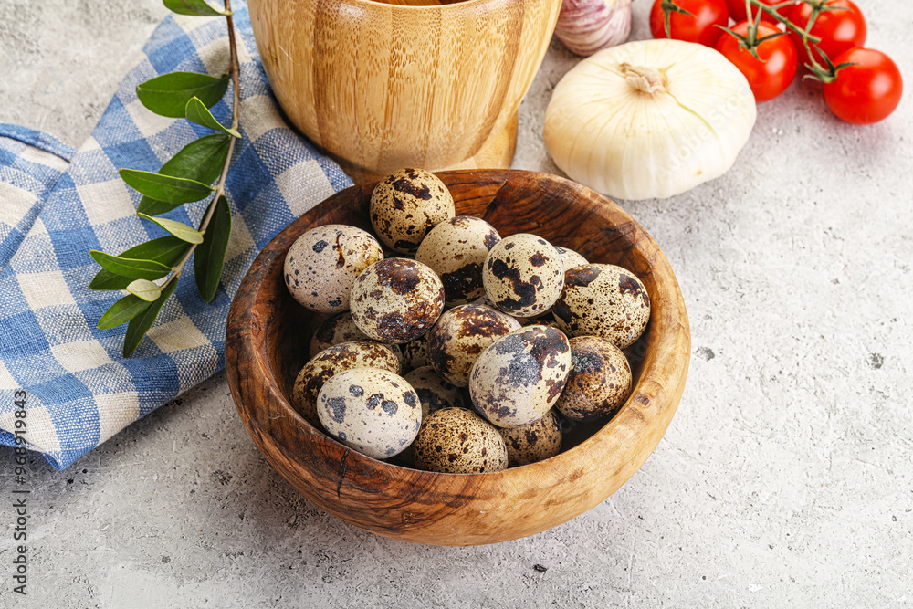 Raw quail eggs in the bowl Raw quail eggs in the bowl