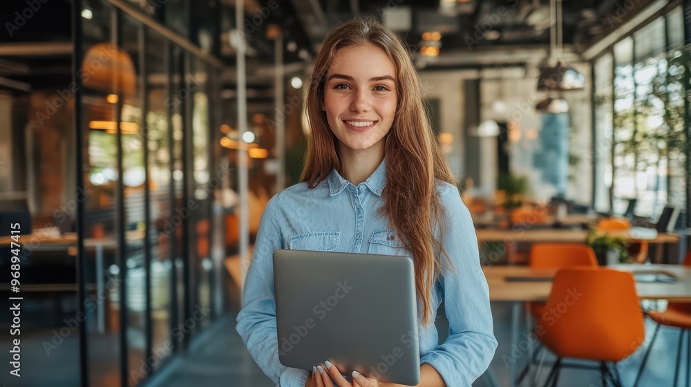 Fototapeta premium The Happy Young Woman Holding Laptop