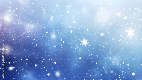 Delicate white snowflakes gently fall against a soft, blurred blue background, creating a serene winter scene. The snow-covered landscape adds a peaceful, seasonal ambiance.