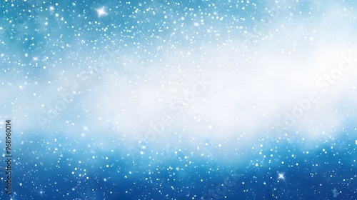 Delicate white snowflakes gently fall against a soft, blurred blue background, creating a serene winter scene. The snow-covered landscape adds a peaceful, seasonal ambiance.