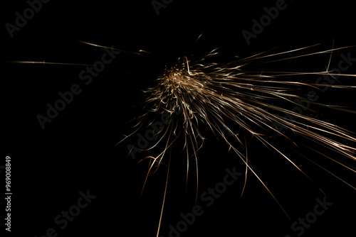 sparks from the grinder glowing in the dark