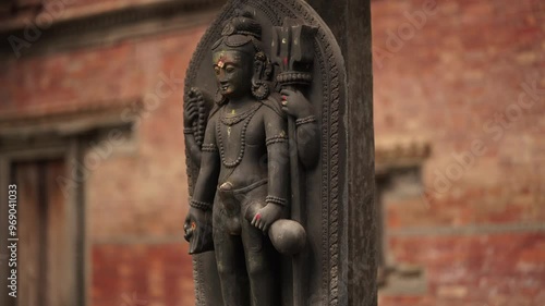 
Statue of Hindu God Kaam Dev in Temple of Nepal, Deity of Hindu God on the Wall of the Temple photo