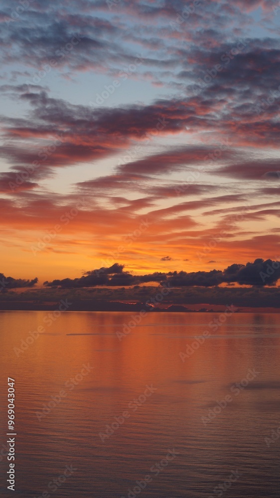 bright incredible orange sunset over the sea horizontal photo bright incredible orange sunset over the sea horizontal photo
