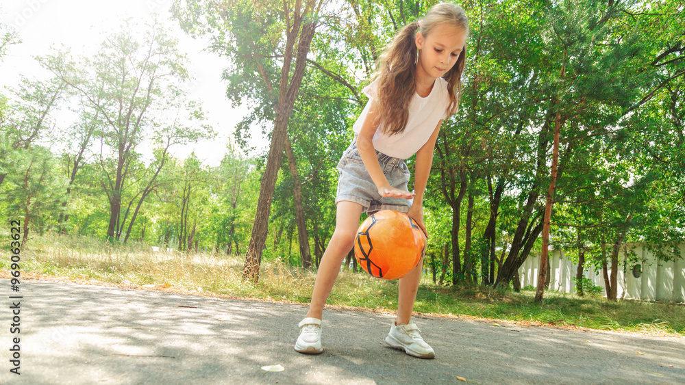 8-9 year old caucasian child girl playing with a soccer ball outdoor 8-9 year old caucasian child girl playing with a soccer ball outdoor