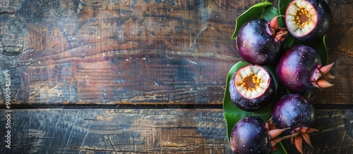 Mangosteen fruit on a woode...