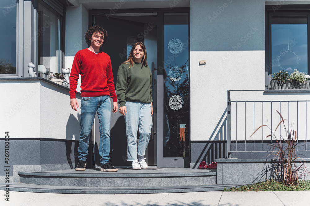 Couple leaving their new apartment, going on a walk. Couple leaving their new apartment, going on a walk.