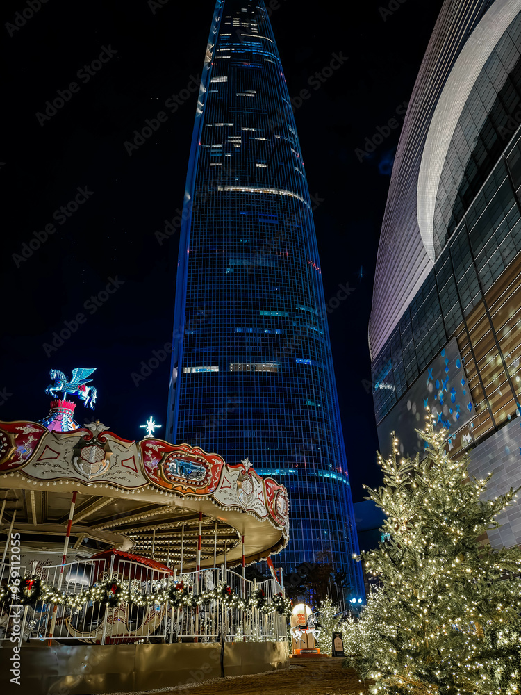 Christmas pine tree near Lotte World Tower. Seoul city, South Korea.