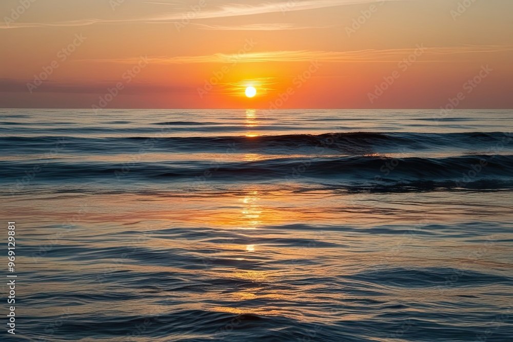 Fototapeta premium Tranquil Sunset Reflections on Glimmering Ocean Waves