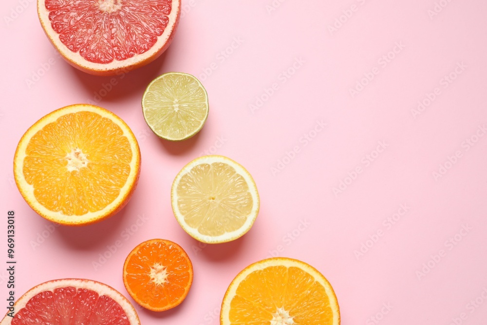 Tropical fruits on a colored background. Summer concept. Flat lay, top view, copy space Tropical fruits on a colored background. Summer concept. Flat lay, top view, copy space